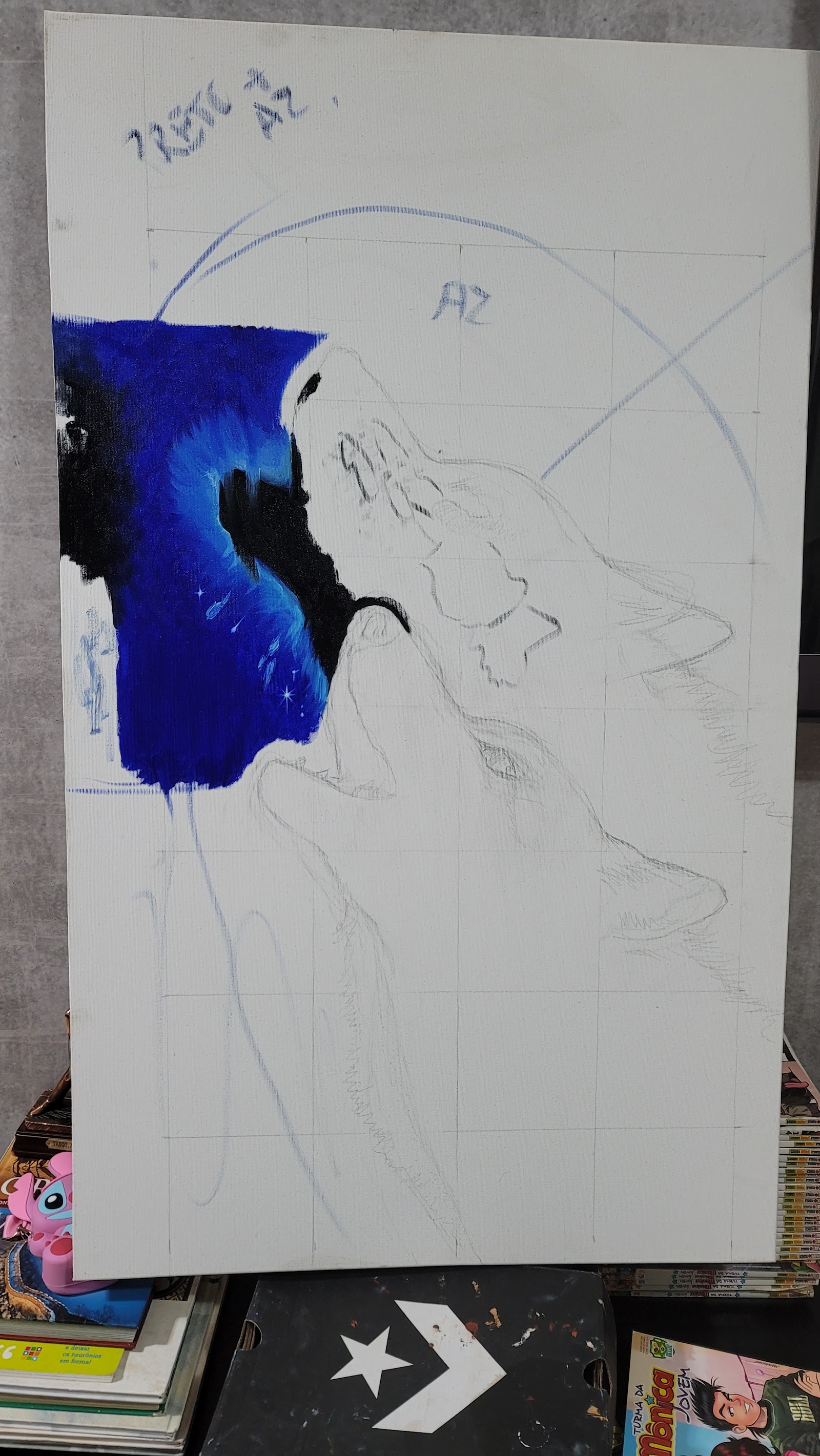Tela com o esboço a lápis dos lobos e a primeira área pintada em azul