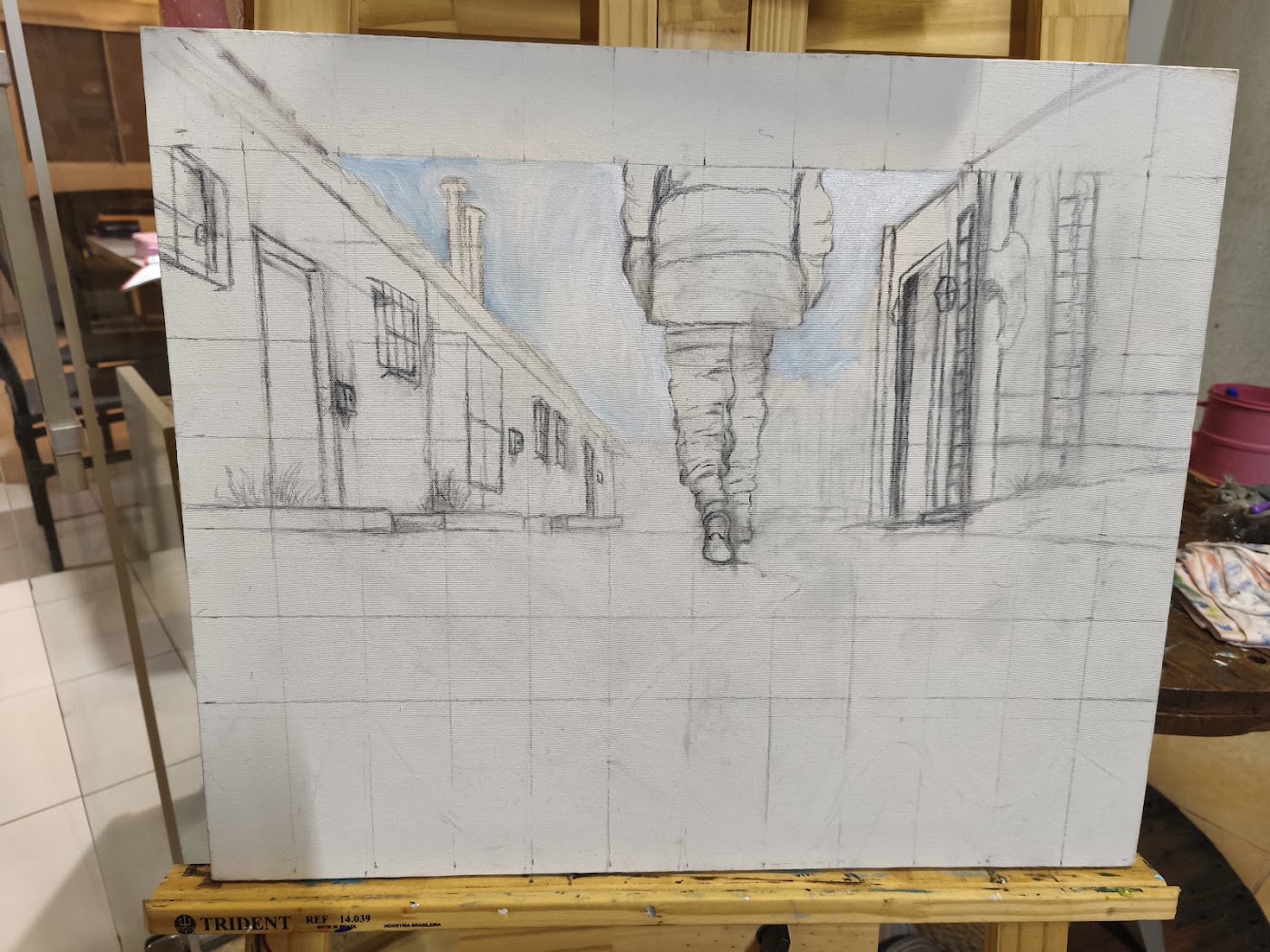 Tela com o desenho a lápis da rua e do caminhante